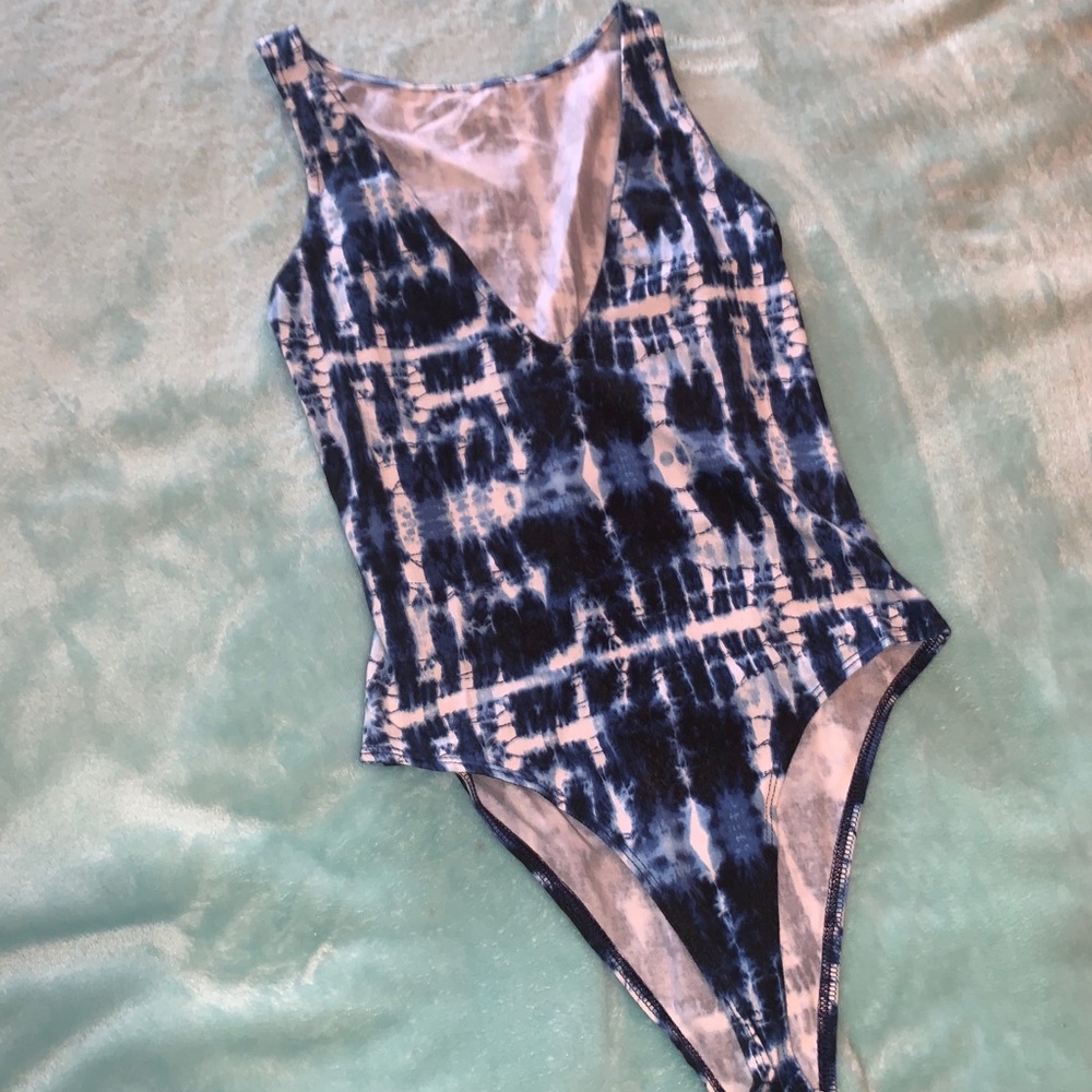 Blue tye-dye body suit. low cut/reversable M